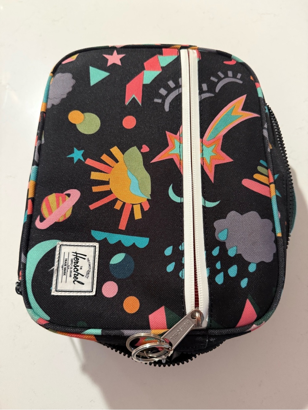 Herschel Supply Company Kids Lunch Bag - Black with Multicolor Space Print